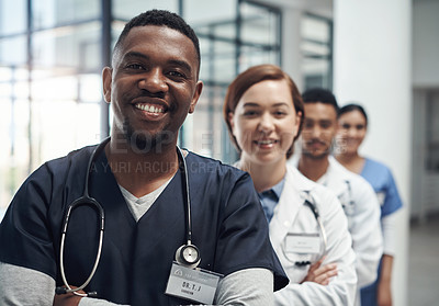 Buy stock photo Doctors, man and arms crossed with smile, team or portrait for diversity in medical career at hospital. Surgeon group, people and women with collaboration, wellness and pride for healthcare services
