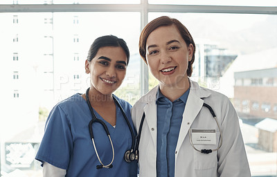 Buy stock photo Portrait, women and doctors in hospital, hug and confidence with pride, teamwork and cooperation. Face, people and medical with professional, medical and mentor with intern, collaboration and smile