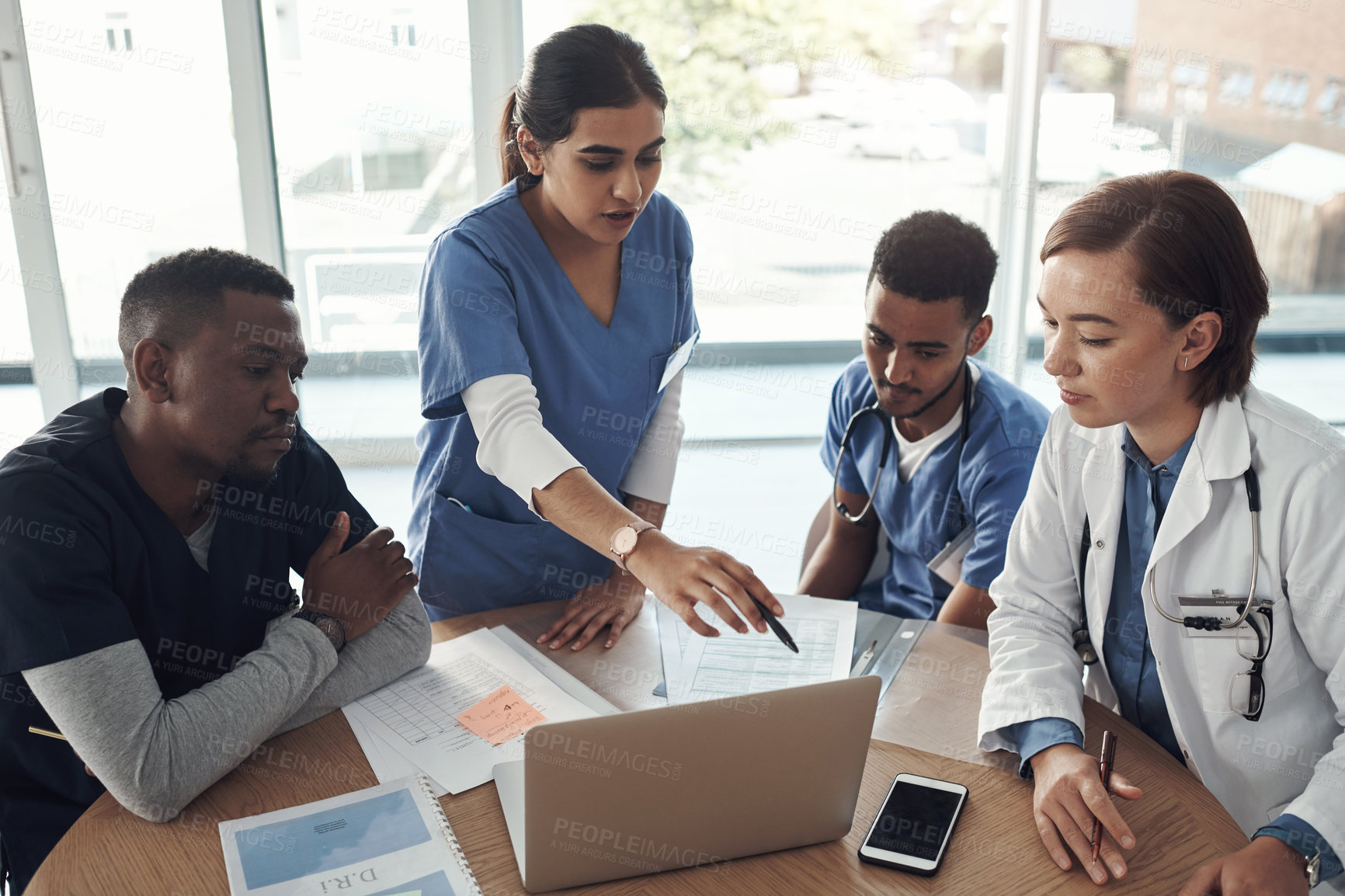 Buy stock photo People, nurse and teamwork in meeting with computer, presentation and idea for solution in medical residency. Healthcare doctors, student and group leadership with online research for clinical trial