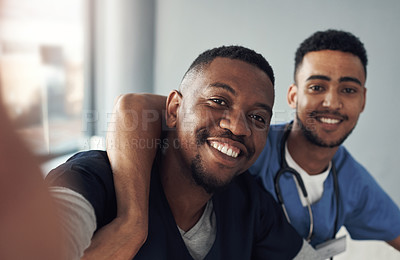 Buy stock photo Portrait, doctors and happy in selfie for social media profile picture, healthcare team and friends in hospital. Men, smile and faces of new medical worker with picture or photo for memory with smile