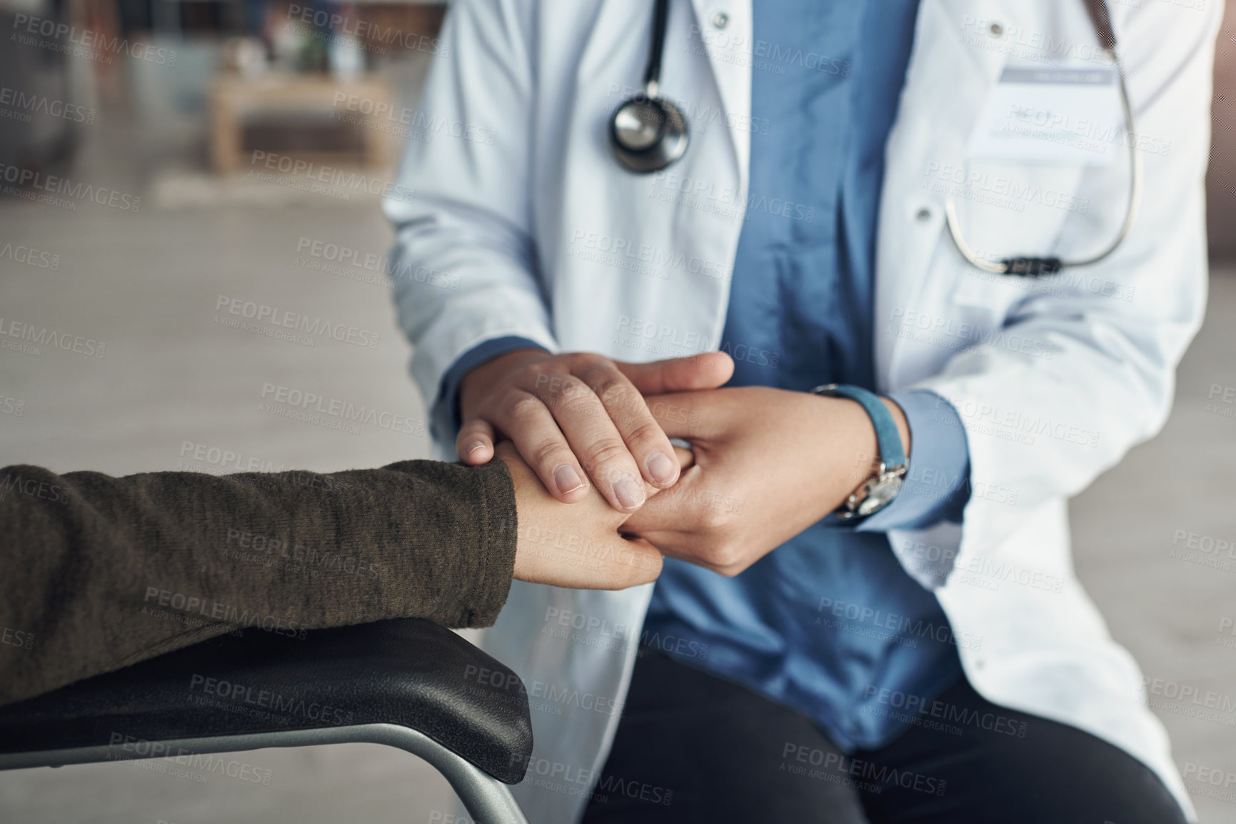Buy stock photo Doctor, person and holding hands for healthcare support in hospital office with closeup, empathy and kindness. Professional, expert and patient with sympathy for medical results, diagnosis and health