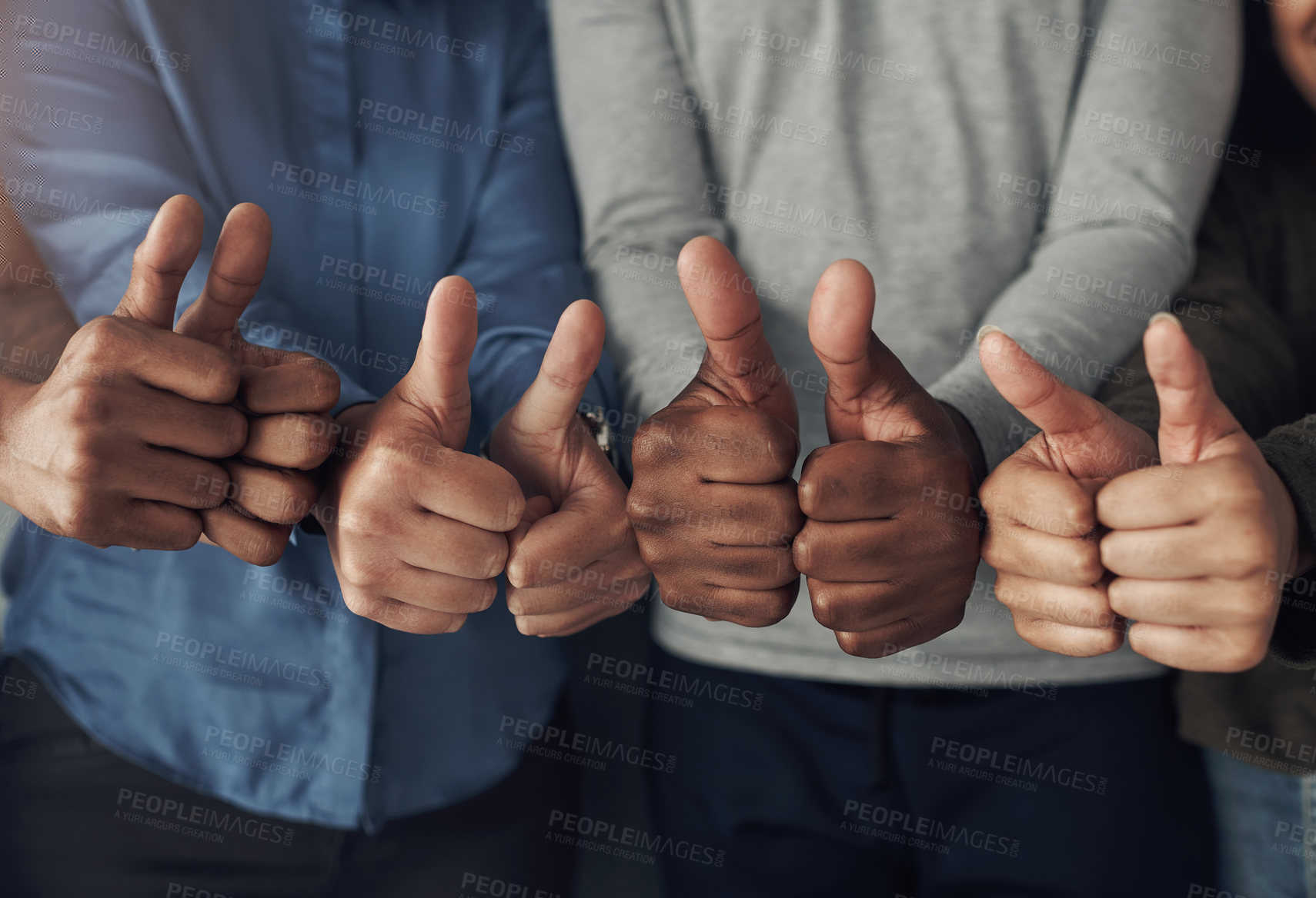 Buy stock photo Cropped shot of a group of unrecognizable people showing thumbs up