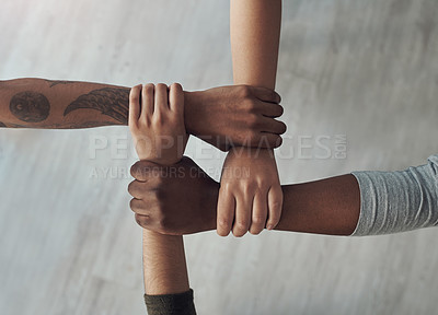 Buy stock photo Cropped shot of a group of unrecognizable people holding each others wrists