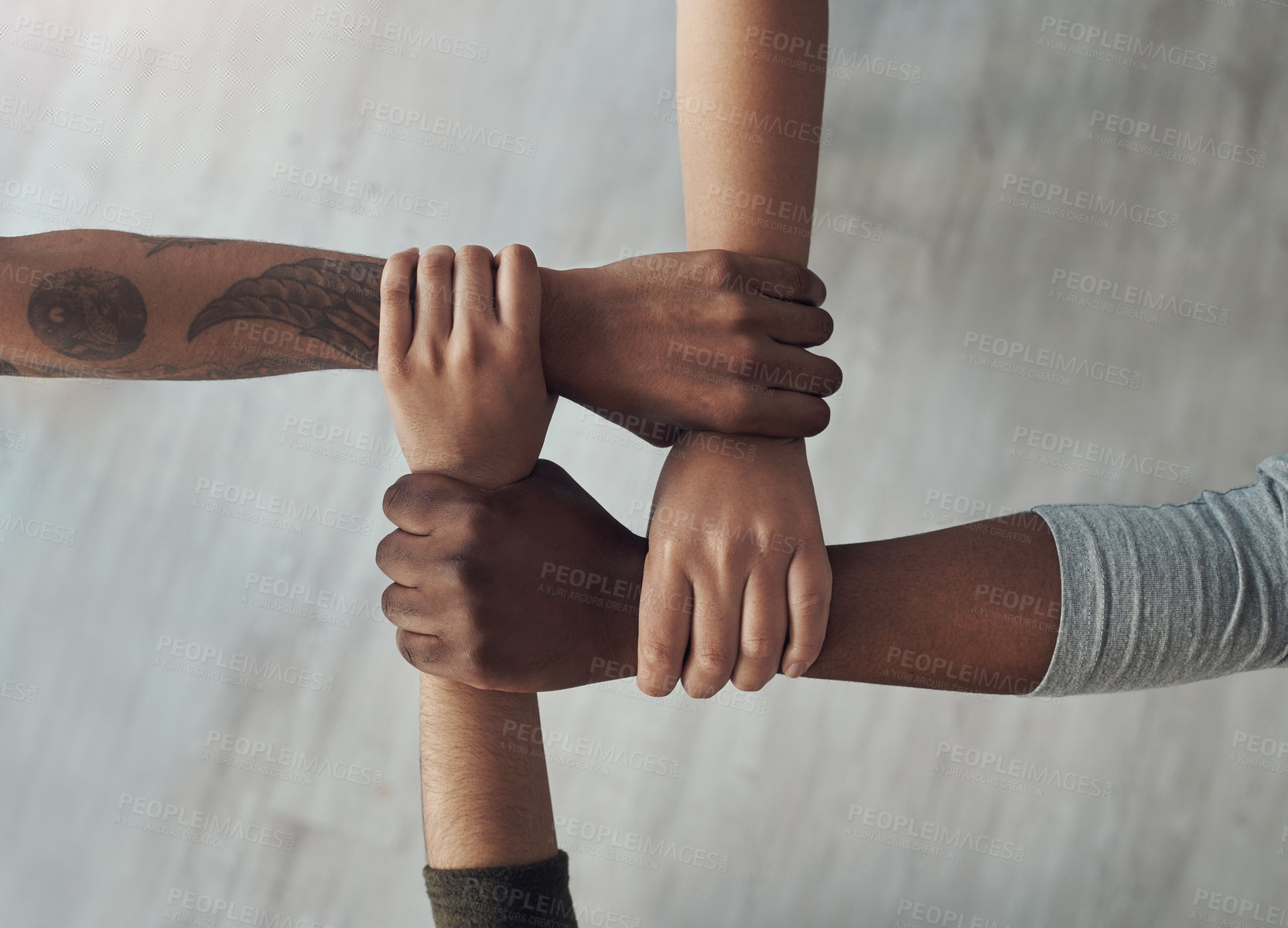 Buy stock photo Cropped shot of a group of unrecognizable people holding each others wrists