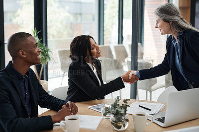 Buy stock photo Office, handshake and business people with agreement for teamwork, partnership and networking. B2b, deal and professional employees with thank you, welcome and support in cooperation in workplace