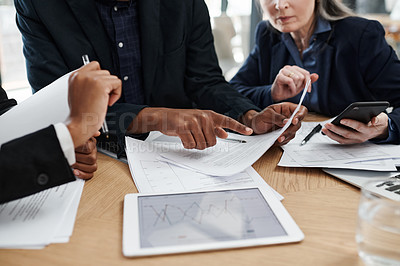 Buy stock photo Shot of a group of unrecognisable businesspeople having a meeting in a modern office