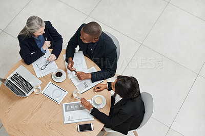 Buy stock photo Top view, team and employees planning, collaboration and brainstorming for new project, discussion and partnership. Coworkers, black man and women share ideas, feedback and meeting with development