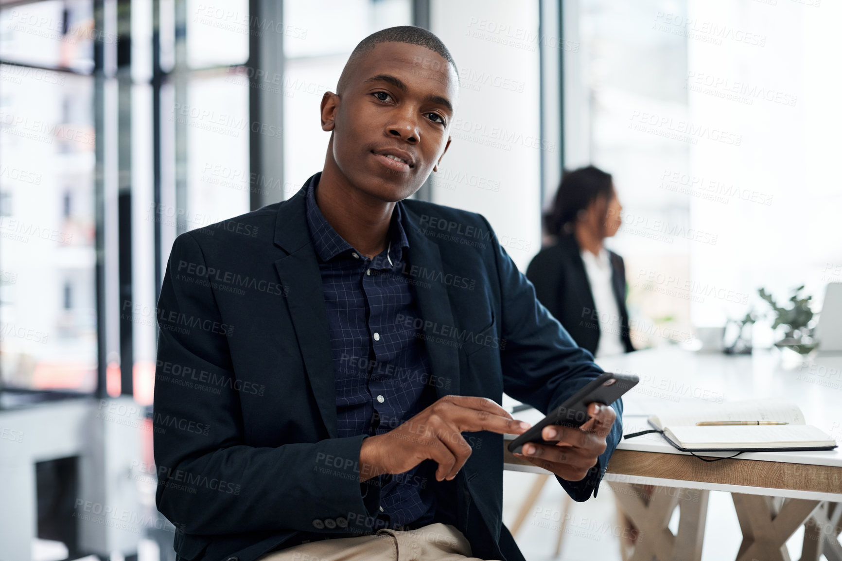 Buy stock photo Black man, portrait and phone for planning in meeting, communication and networking in office. Male person, boardroom and website for online research, professional and  chat to business contact