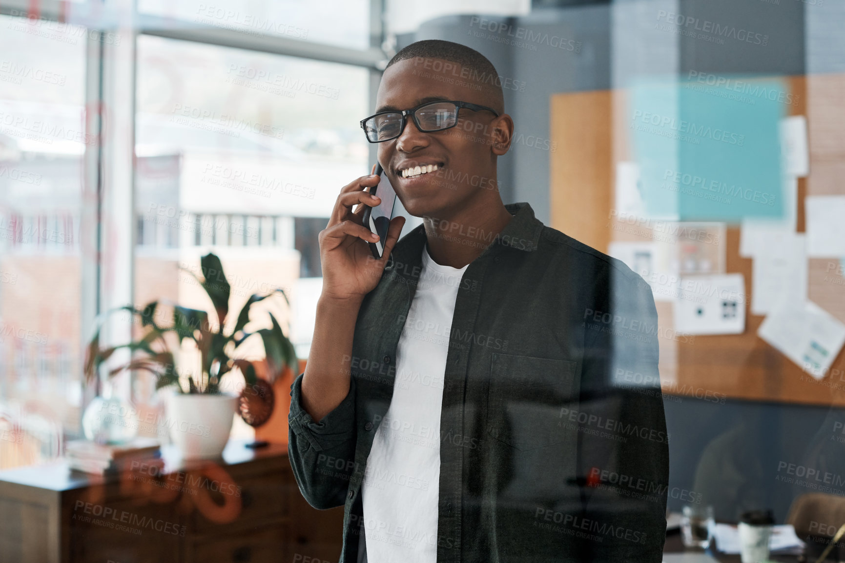 Buy stock photo Businessman, black man and phone in office for communication with negotiation proposal for networking. Smile, African employee and talking on mobile for discussion with feedback on project deal 