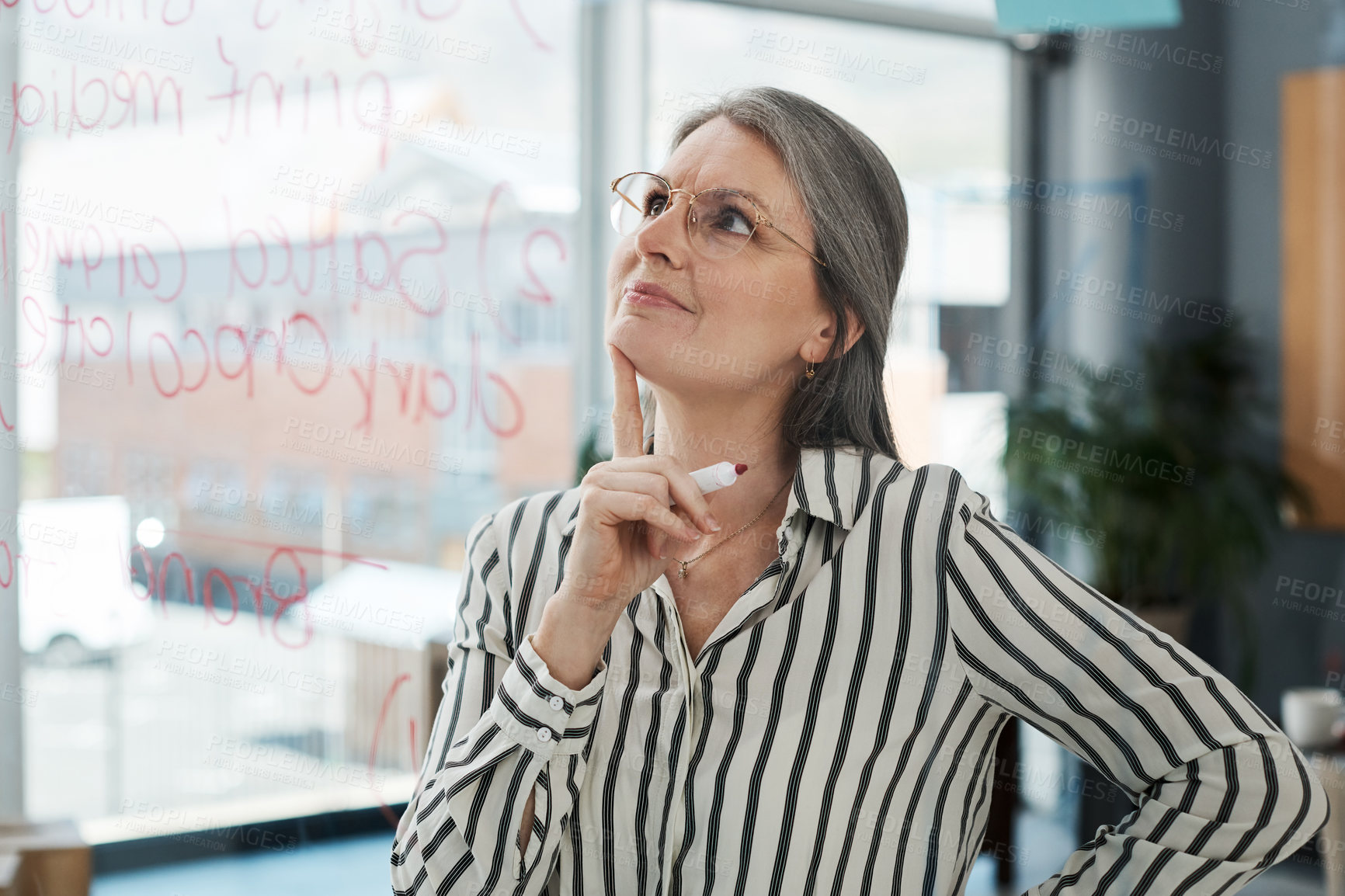 Buy stock photo Business woman, thinking and planning on glass with brainstorming, ideas and research for public relations. Creative mature worker with goals or vision for candy product development in print media