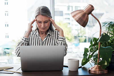 Buy stock photo Business woman, headache and stress on computer for deadline, mistake or error of human resource payroll. Mature worker or boss on laptop with migraine, pain or health risk in career, job and office