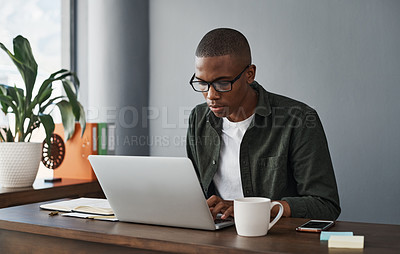 Buy stock photo Business, laptop and black man typing in office for software, research and check information in creative startup. Computer, web developer and reading email on internet for planning project online