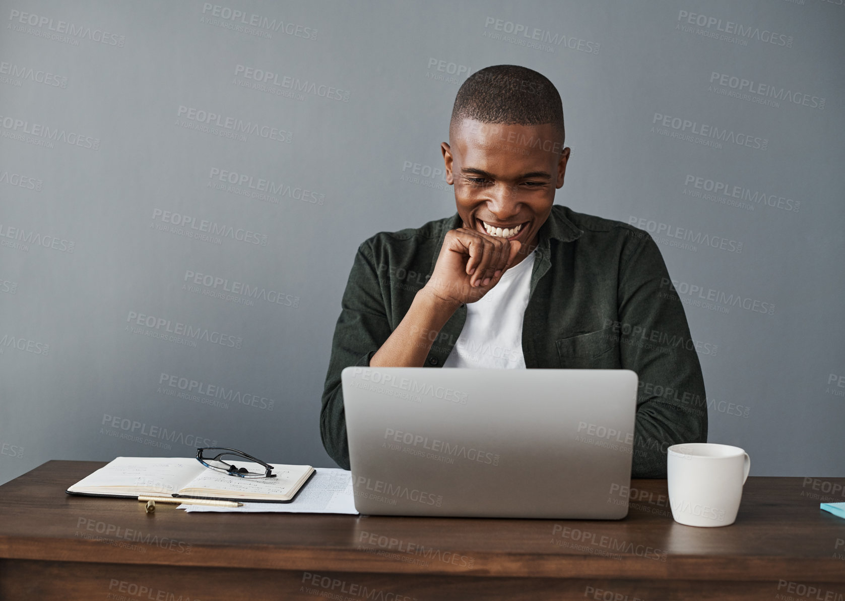 Buy stock photo Office, laptop and happy black man reading good news, research and check information in creative startup business. Computer, graphic designer and smile on internet for email or project results online