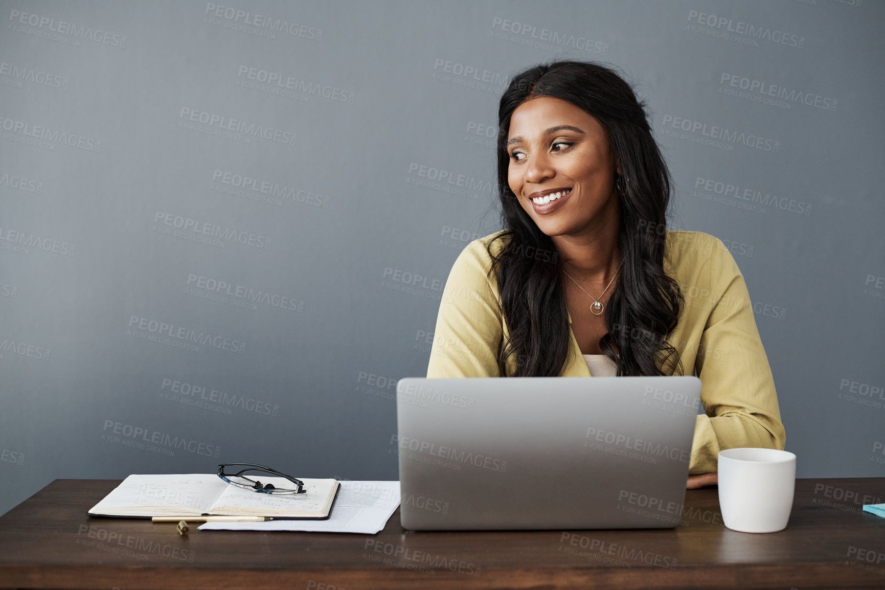 Buy stock photo Shot of a young businesswoman working from home