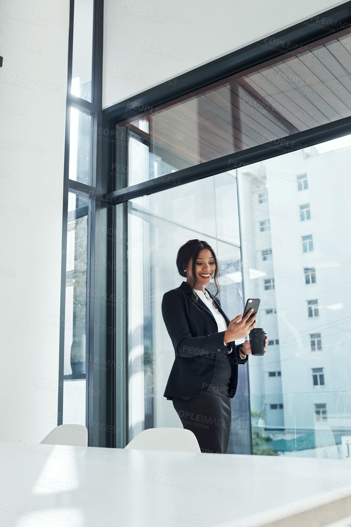 Buy stock photo Watch, video and black woman with phone in office with social media, post or scroll on coffee break. Employee, reading and relax with website, chat or communication in workplace with app or tech