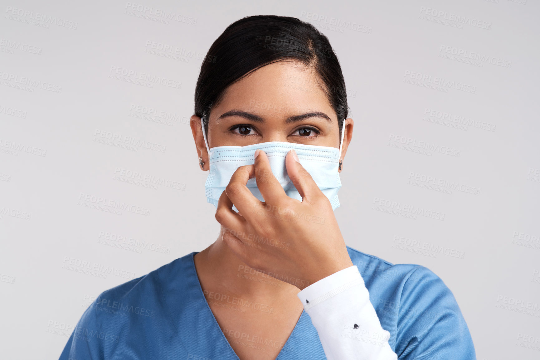 Buy stock photo Medical, nurse and woman with face mask in studio for safety, virus protection and portrait. Healthcare worker, person and wear PPE for bacteria prevention, hygiene and wellness on white background