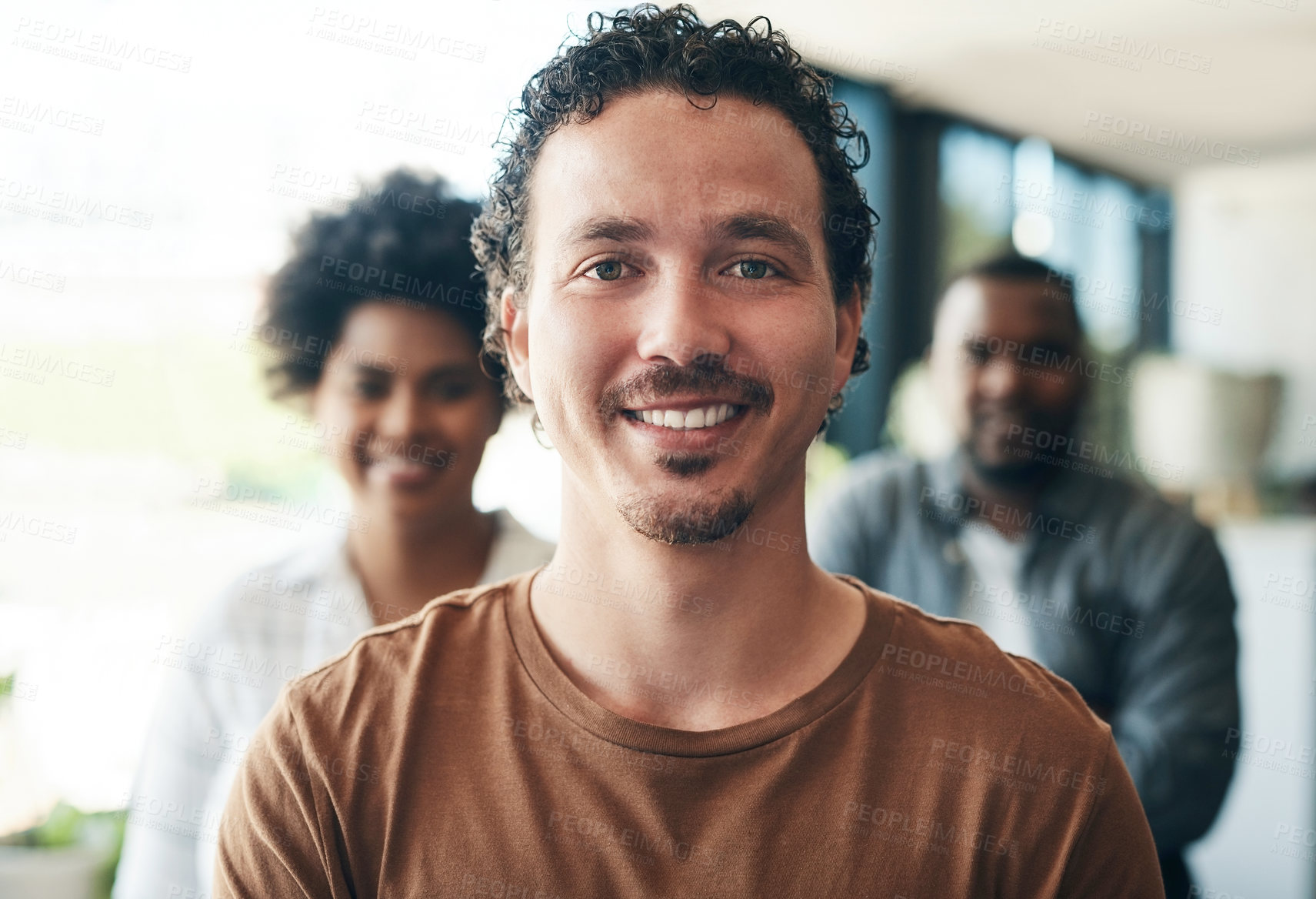 Buy stock photo Shot of a group of businesspeople smiling in an office