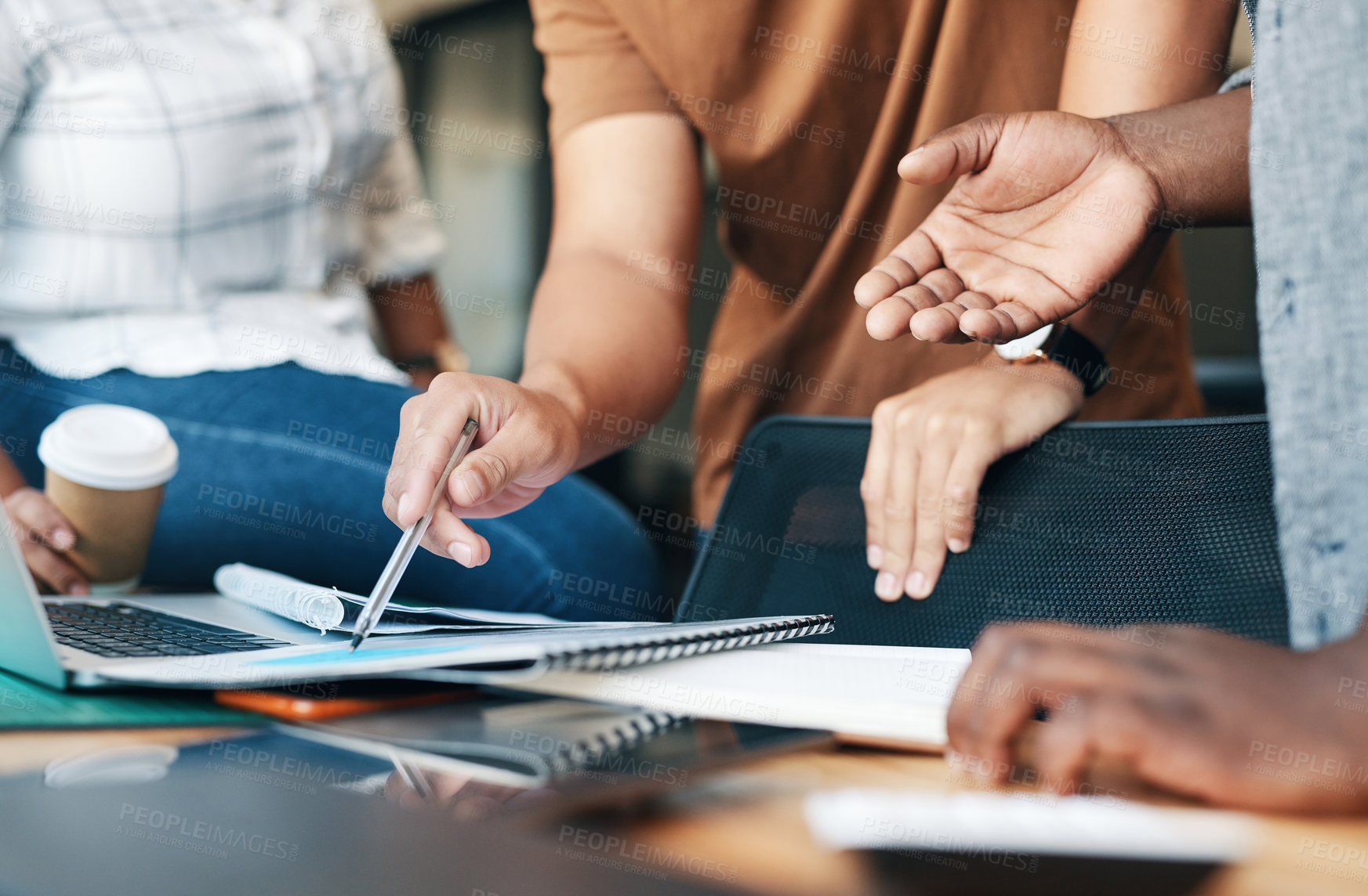 Buy stock photo Shot of a group of unrecognizable businesspeople working together in an office