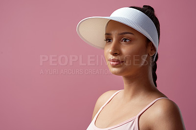 Buy stock photo Cropped shot of an attractive and sporty young woman posing in studio against a pink background