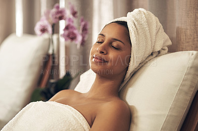Buy stock photo Spa, woman and relax with eyes closed for calm, zen and peace for physical therapy, health and wellness. Female customer with smile, luxury and towel for a holistic massage and hospitality at a salon