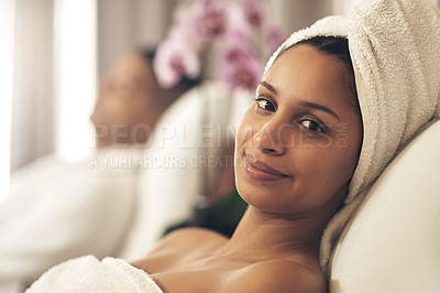 Buy stock photo Shot of a woman wearing a towel around her head while enjoying a spa day