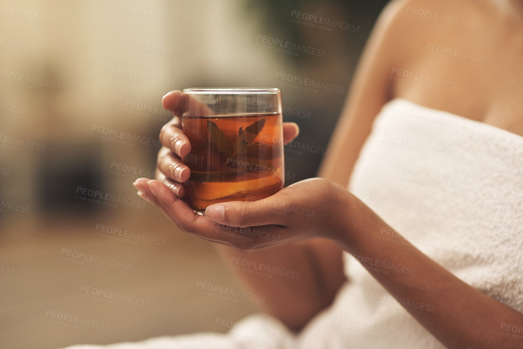 Buy stock photo Hands, woman and relax with tea at spa for peace, calm morning and natural detox for wellness. Female person, cup or chamomile with herbal beverage for hydration, digestion benefits and stress relief