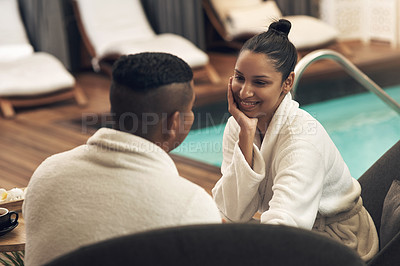 Buy stock photo Shot of a young couple spending the day together at a spa