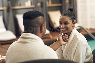 Buy stock photo Shot of a young couple spending the day together at a spa