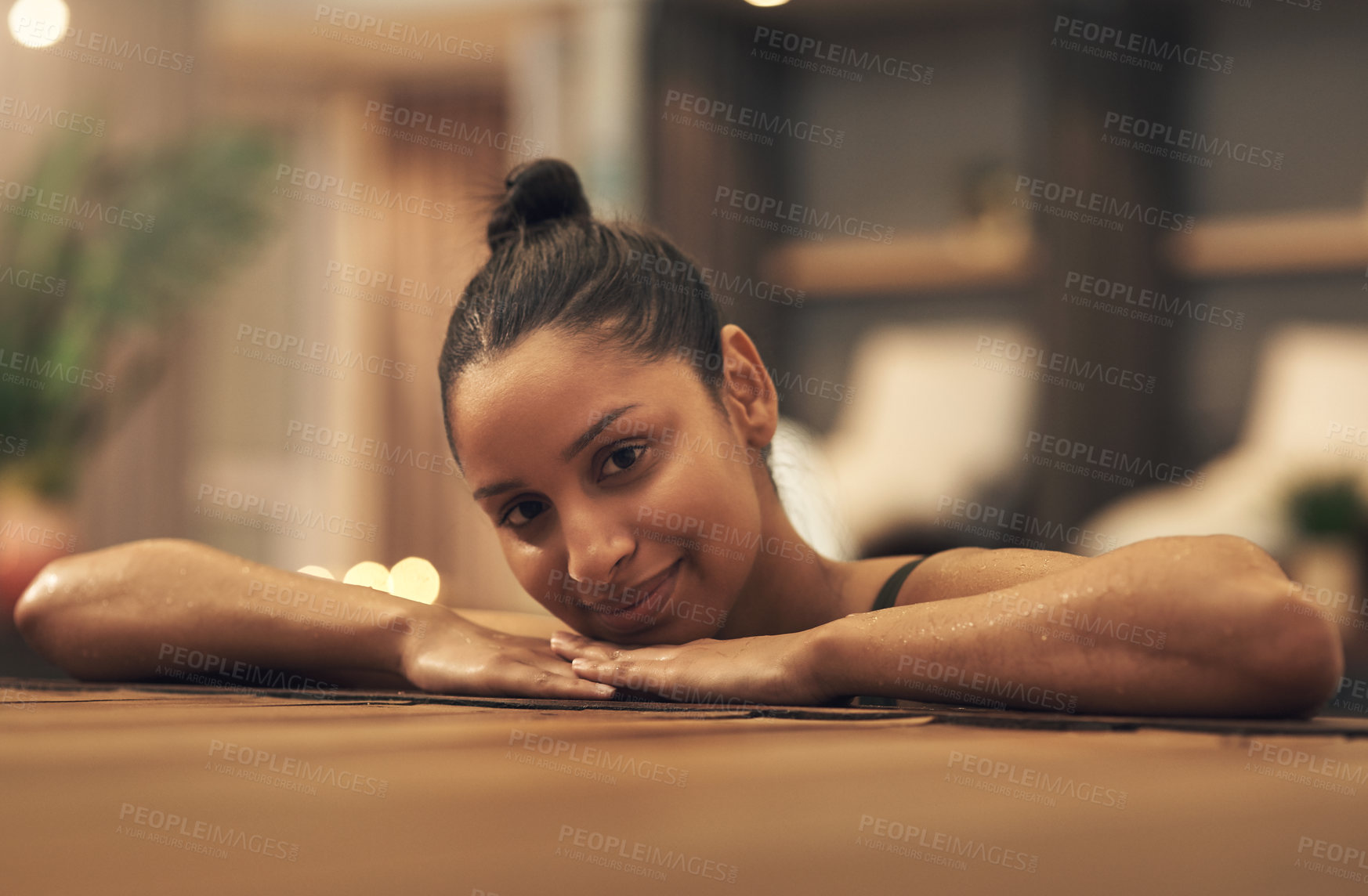 Buy stock photo Shot of a young woman relaxing in a pool at a spa