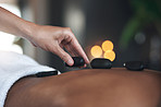 Sore muscles? A hot stone massage will fix it