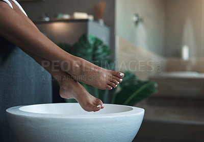 Buy stock photo Closeup shot of an unrecognisable woman getting a foot treatment at a spa