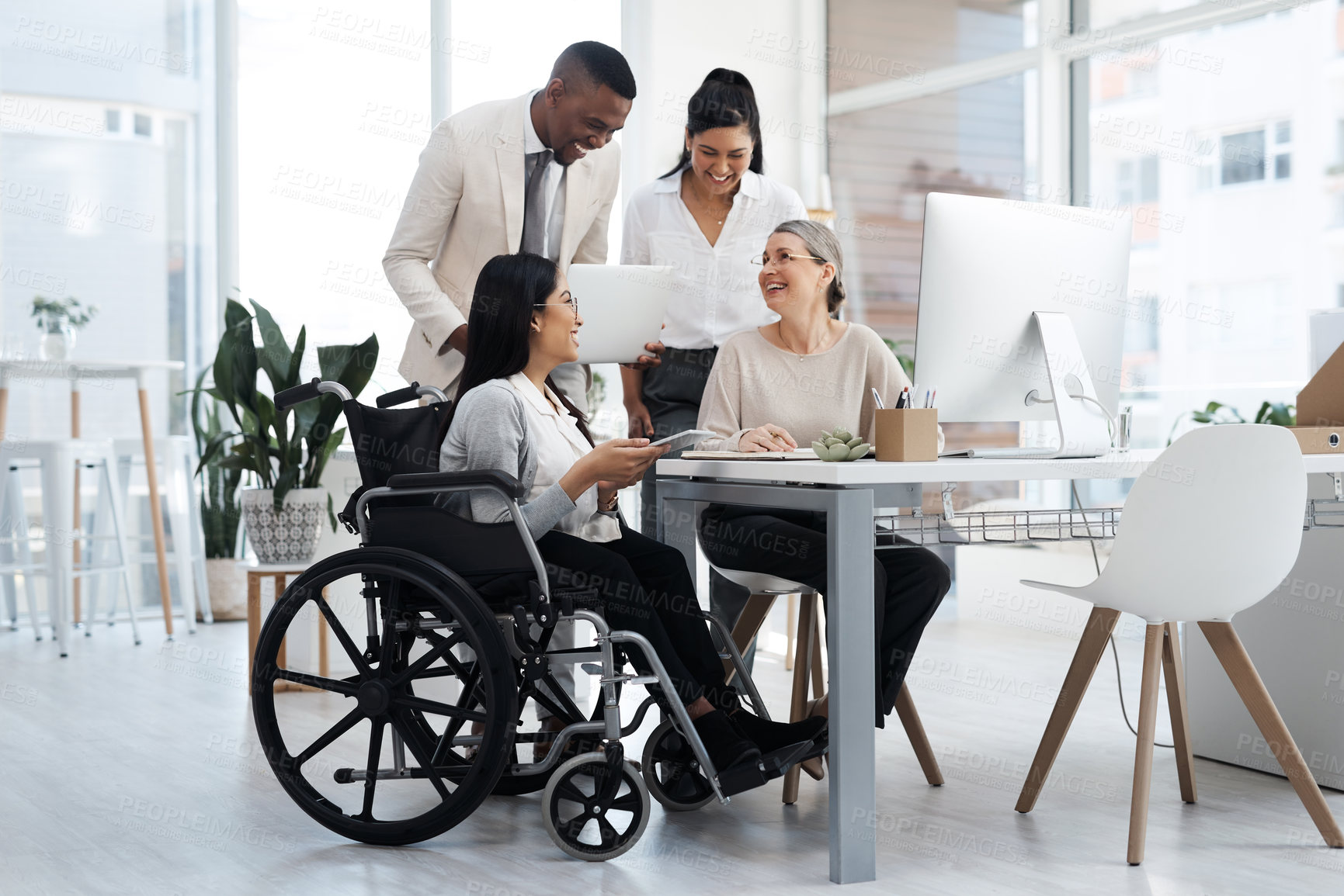 Buy stock photo Full length shot of a group of diverse businesspeople having an informal meeting in their office