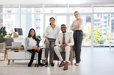 Buy stock photo Full length shot of a group of diverse businesspeople gathered in their office