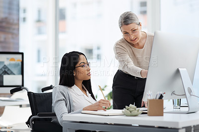 Buy stock photo Cropped shot of an attractive young businesswoman getting some information from her human resources manager in the office