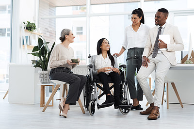 Buy stock photo Full length shot of a group of diverse businesspeople having an informal meeting in their office