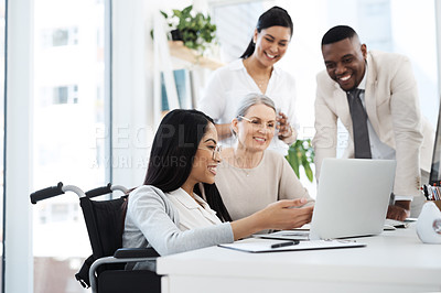 Buy stock photo Cropped shot of a group of diverse businesspeople having an informal meeting in their office