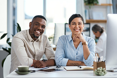 Buy stock photo Portrait of two businesspeople working together in an office