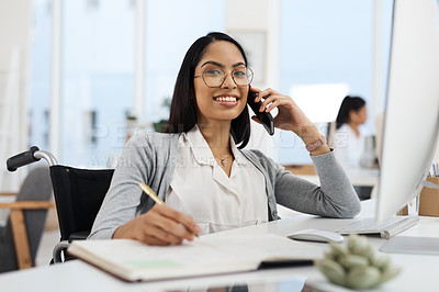 Buy stock photo Cropped portrait of an attractive young businesswoman making a phonecall while working at her desk in the office