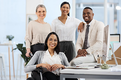 Buy stock photo Cropped portrait of a group of diverse businesspeople smiling while gathered in their office