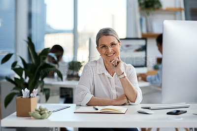 Buy stock photo Portrait of a mature businesswoman working in an office
