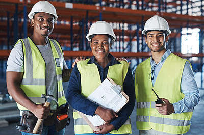 Buy stock photo Shot of a group of contractors standing together in the warehouse