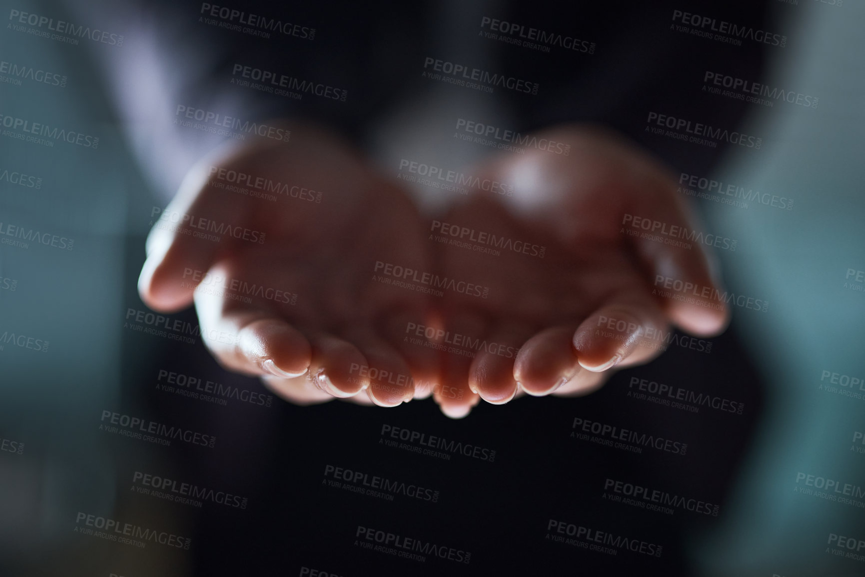 Buy stock photo Cropped shot of an unrecognizable businessman standing with his hands cupped together