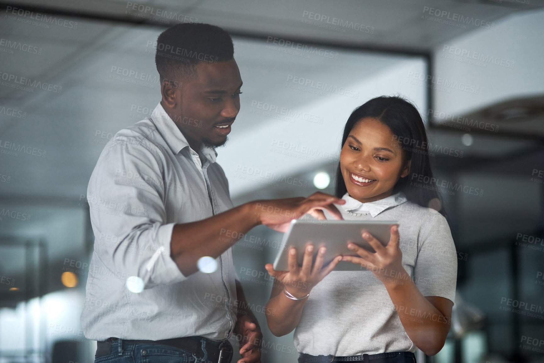 Buy stock photo Shot of Two businesspeople working in a modern office