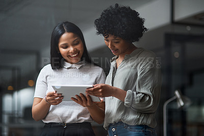 Buy stock photo Shot of Two businesswoman working in a modern office