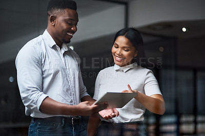 Buy stock photo Shot of Two businesspeople working in a modern office