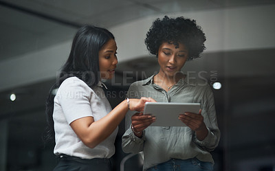 Buy stock photo Shot of Two businesswoman working in a modern office