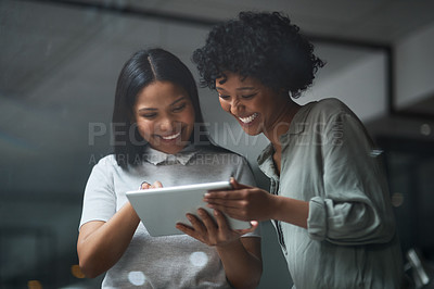 Buy stock photo Shot of Two businesswoman working in a modern office