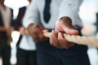 Buy stock photo Cropped shot of unrecognizable businesspeople pulling on a rope