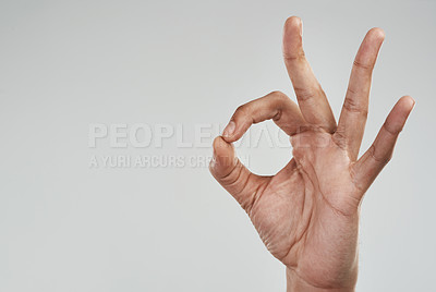 Buy stock photo Cropped shot of an unrecognizable man showing the ok sign