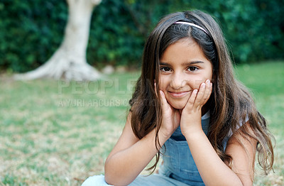 Buy stock photo Children, portrait and summer with girl on lawn to relax outdoor in fresh air for weekend time off. Face, nature and smile with happy young kid sitting on grass in park for development or growth